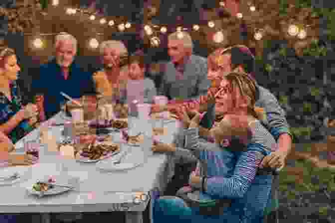 A Black And White Photograph Of A Family Gathered Around A Table, Laughing And Smiling. America By Heart: Reflections On Family Faith And Flag