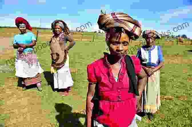 A Group Of People Gathered On A Field, Discussing Land Reform In South Africa Land Reform In South Africa: An Uneven Transformation