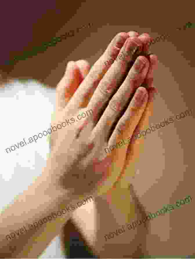 A Photograph Of Two Hands Clasped Together In Prayer. America By Heart: Reflections On Family Faith And Flag