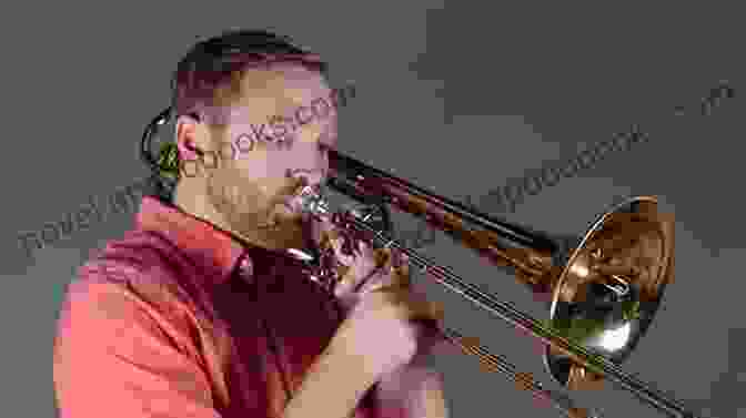 Close Up Of A Bass Trombone Player's Hands Playing An Etude 11 Orchestral Etudes For Bass Trombone