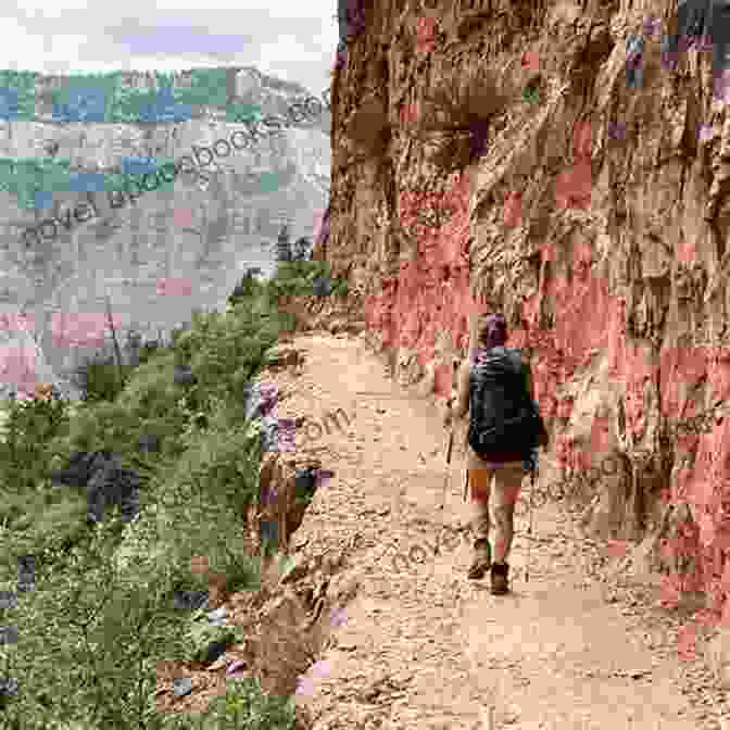 Hiker Trekking Along The Grand Canyon Rim To Rim Trail With Stunning Views Of The Canyon's Vast Expanse And Colorful Layers Of Rock Formations Grand Canyon Rim To Rim Complete Backpacking Guide: Hike The Grand Canyon Rim To Rim