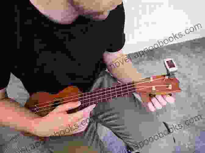 Person Tuning A Ukulele How To Play ANYTHING On The Ukulele