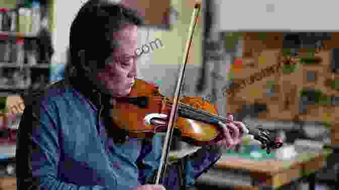 Violinist Watching Video Lesson Violin Primer For Beginners Deluxe Edition With Video Audio Access